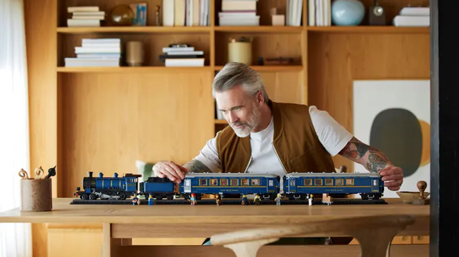 A man with his LEGO Ideas Orient Express Train