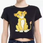 A person wearing a Disney The Lion King Girls Baby T Shirt