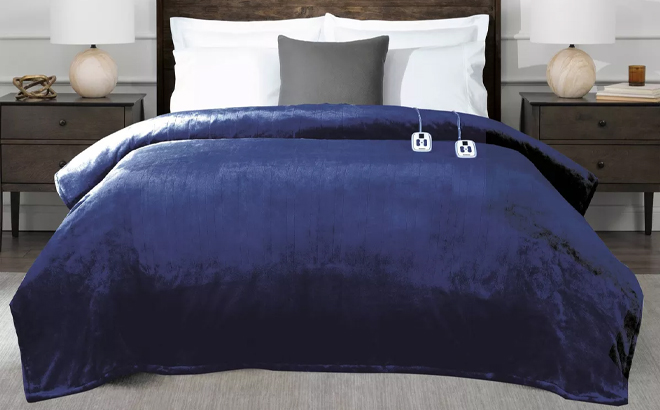 Brookstone Heated Blanket on a Bed in Navy