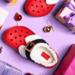 Classic Lined Santa Clogs beside Gifts