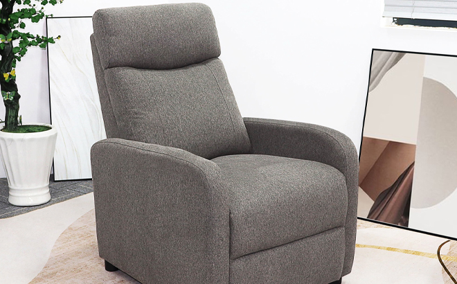 Comhoma Adjustable Recliner with Footrest in a Room