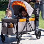 Delta Children Jeep Sport All Terrain Stroller Wagon in the Street