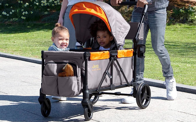 Delta Children Jeep Sport All Terrain Stroller Wagon in the Street