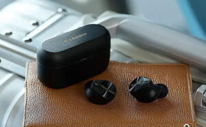 Earbuds on a Leather Surface