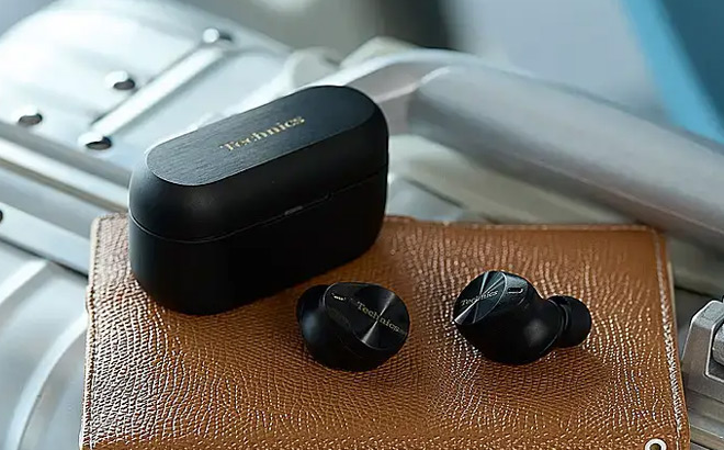 Earbuds on a Leather Surface