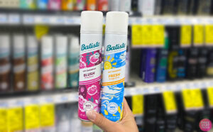 Hand holding Batiste Dry Shampoos