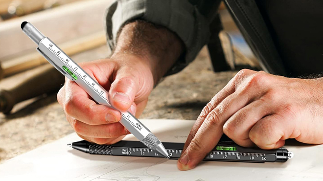 Hands using 9 in 1 Multitool Pen Set