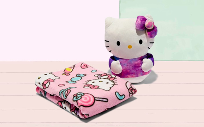 Hello Kitty Sweet Surprise Hugger Pillow Silk Touch Throw Set on the Table