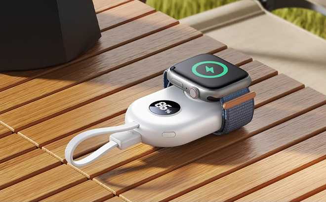 JoyRoom Portable Apple Watch Charger on a Table