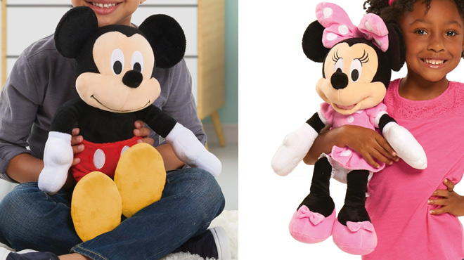 Kids Holding Minnie and Mickey Plush Toys