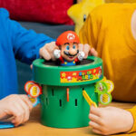 Kids PLaying Tomy Pop Up Super Mario Kids Game