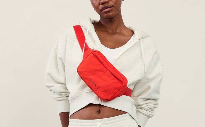 Model Wearing Red Athleta Belt Bag