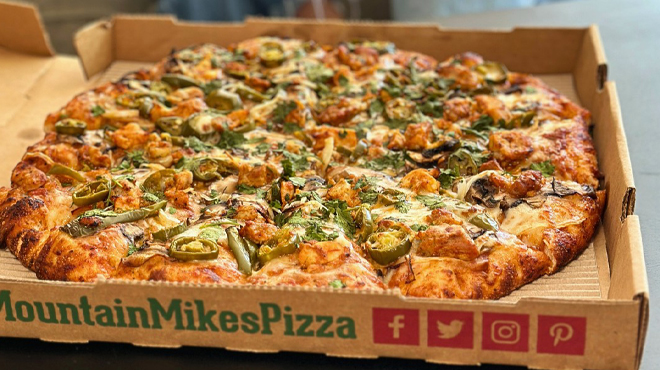 Mountain Mikes Pizza in a Pizza Box on a Table