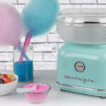 Nostalgia Electrics Classic Retro Hard Sugar Free Candy Cotton Candy Maker on the Table