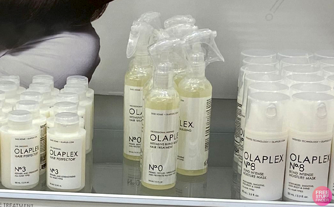 Olaplex No 0 Intensive Bond Building Treatment Spray Bottles on a Shelf