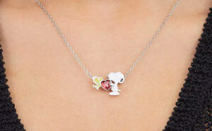 Peanuts Snoopy Woodstock Sterling Silver Plated Heart Necklace on a Neck