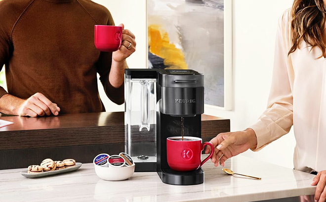 People Making Coffee Using Keurig K Supreme Plus Coffee Maker