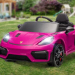 Porsche 718 12V Powered Ride on Toy in Pink Color on the Grass