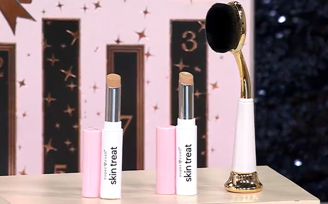 Tarte Sugar Rush Skin Treat Concealer Duo with Brush on a Product Stand