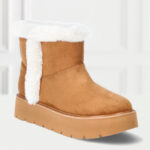 Time and Tru Womens Platform Mini Cozy Boots on the Table