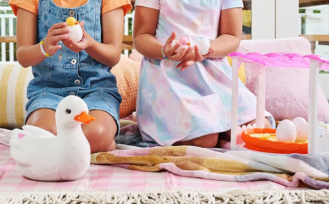 Two Girls Playing with Duck Toys