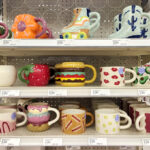 Various Room Essentials Mugs on Shelves at Target Store