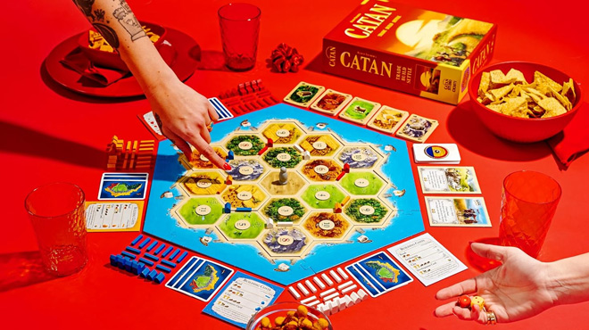 Women Playing Catan Trade Build Settle Board Game