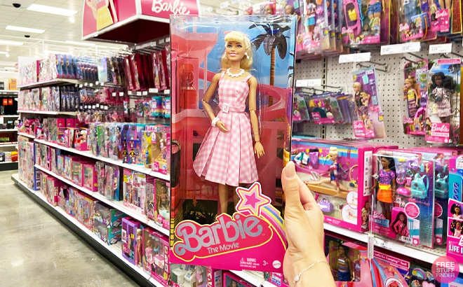 a Person Holding Barbie The Movie Doll