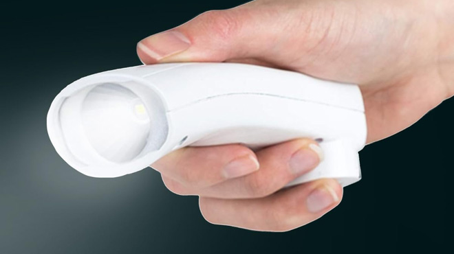 a Person Holding Energizer Weatheready Rechargeable Compact Handheld Light