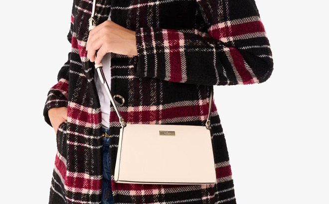 a Person Holding Kate Spade Kenzie Mini Crossbody