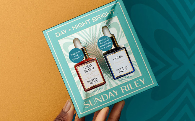 a Person Holding Sunday Riley Day and Night Bright Bundle