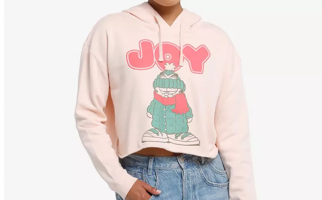 a Person Wearing Garfield Joy Pastel Pink Crop Girls Hoodie