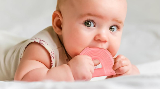 A Baby Using the Itzy Ritzy Water Filled Teether