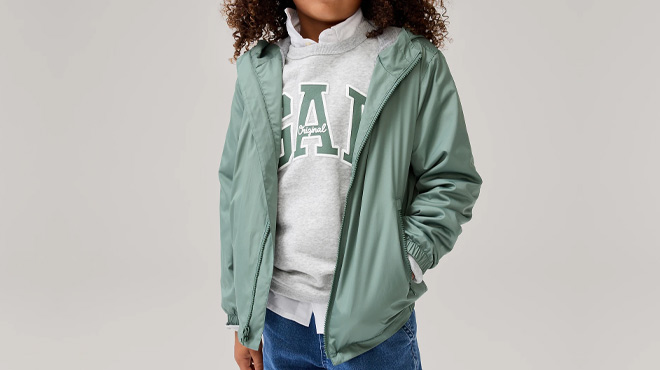 A Boy Wearing GAP Factory Windbreaker