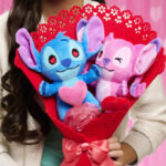 A Girl Holding a Disney Stitch Valentine Medium Plush Bouquet