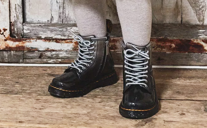 A Kid Wearing Dr Martens CToddler 1460 Gradient Glitter Leather Lace Up Boots