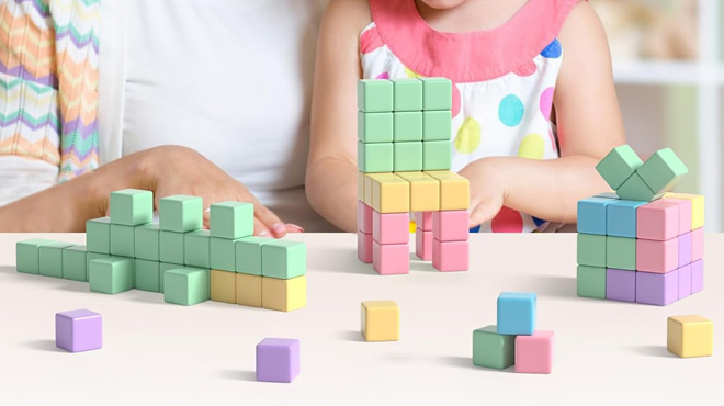 A Mom and Daughter Playing with the Apluses Magnetic Blocks