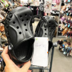 A Person Holding Crocs Toddler Baya Clogs