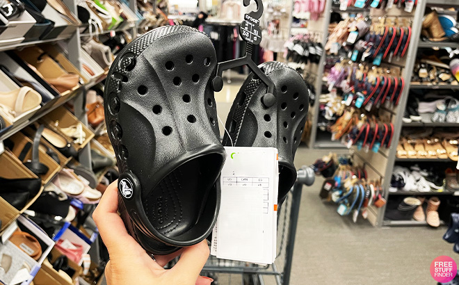 A Person Holding Crocs Toddler Baya Clogs