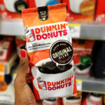 A Person Holding Dunkin Original Blend Medium Roast Ground Coffee