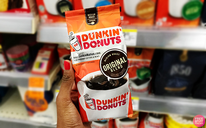 A Person Holding Dunkin Original Blend Medium Roast Ground Coffee