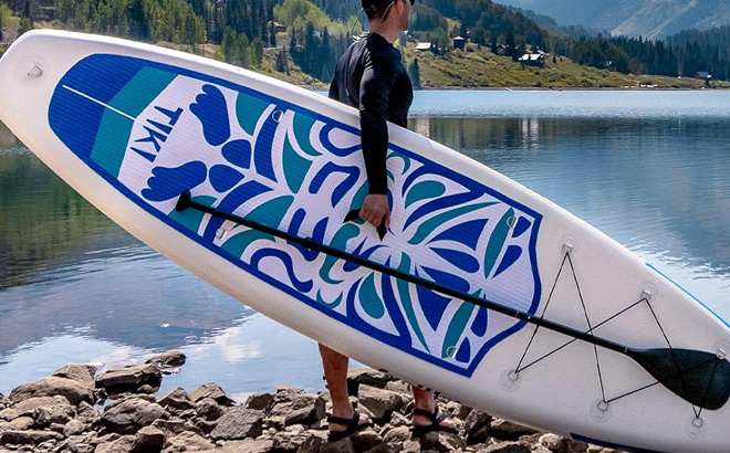 A Person Holding FunWater Inflatable Ultra Light Stand Up Paddle Board