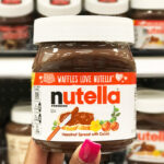 A Person Holding Nutella Hazelnut Spread With Cocoa