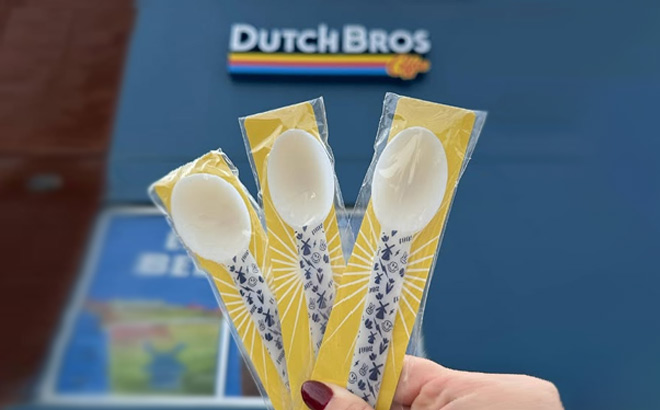 A Person Holding Three Magical Cereal Spoons