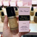 A Person Holding Too Faced Born This Way Foundation