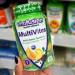 A Person Holding Vitafusion MultiVites Gummy Multivitamins