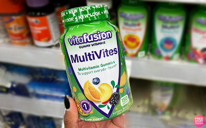 A Person Holding Vitafusion MultiVites Gummy Multivitamins