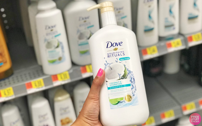 A Person Holding a Bottle of Dove Ultra Care Nourishing Daily Shampoo