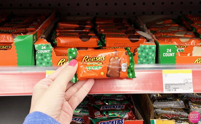 A Person Holding a Reeses Peanut Butter Trees Christmas Candy