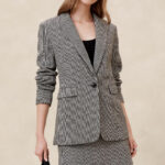 A Person Wearing a Banana Republic Factory Wool Blend Houndstooth Blazer